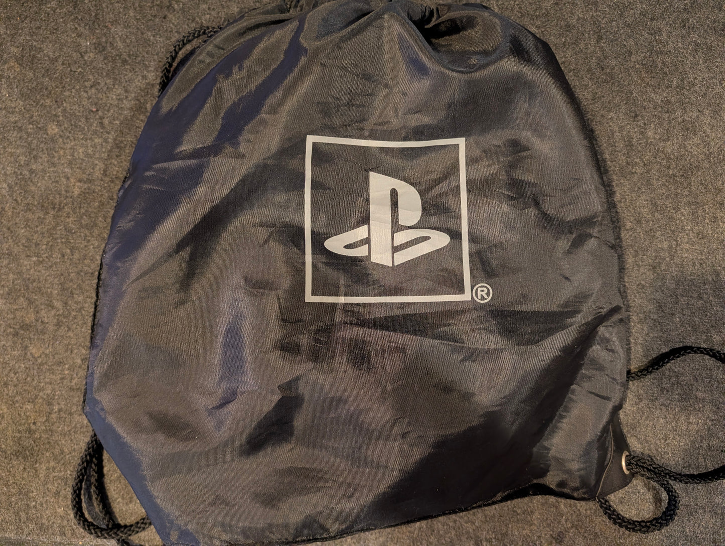 Sony PlayStation Portable (PSP) promotional plush neck travel pillow.